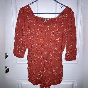 Size medium Arizona Jean Company orange floral romper